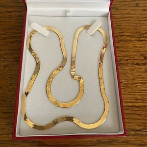 Almost new… worn this necklace once.  14k solid gold, 24 inches long, 5mm wide.